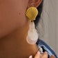 18K gold shell-shaped earrings with round tassel design