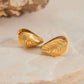 18K gold open sea clam with textured design exquisite and fashionable earrings