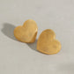 18k gold heart-shaped earrings with grainy design