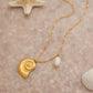 18K gold conch-shaped necklace with pearl design